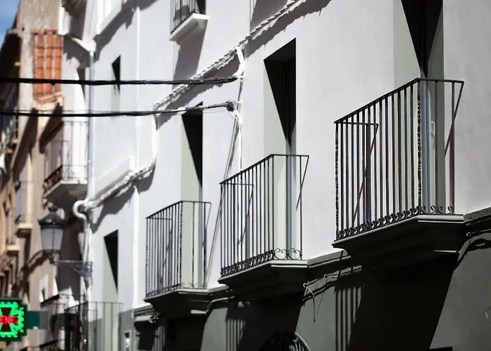 Habitavit En * Касерес